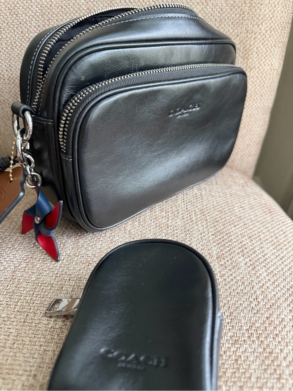 Coach Black Finlay Leather Men's Belt/Crossbody Bag with Red & Blue Charm